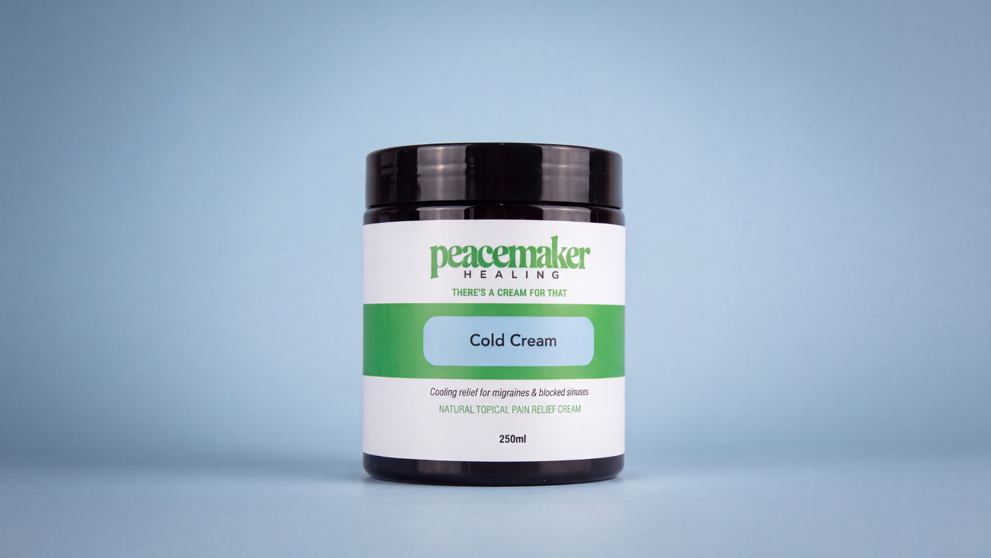 Applying Peacemaker Healing Cold Cream to the temples and under the nose before bed
